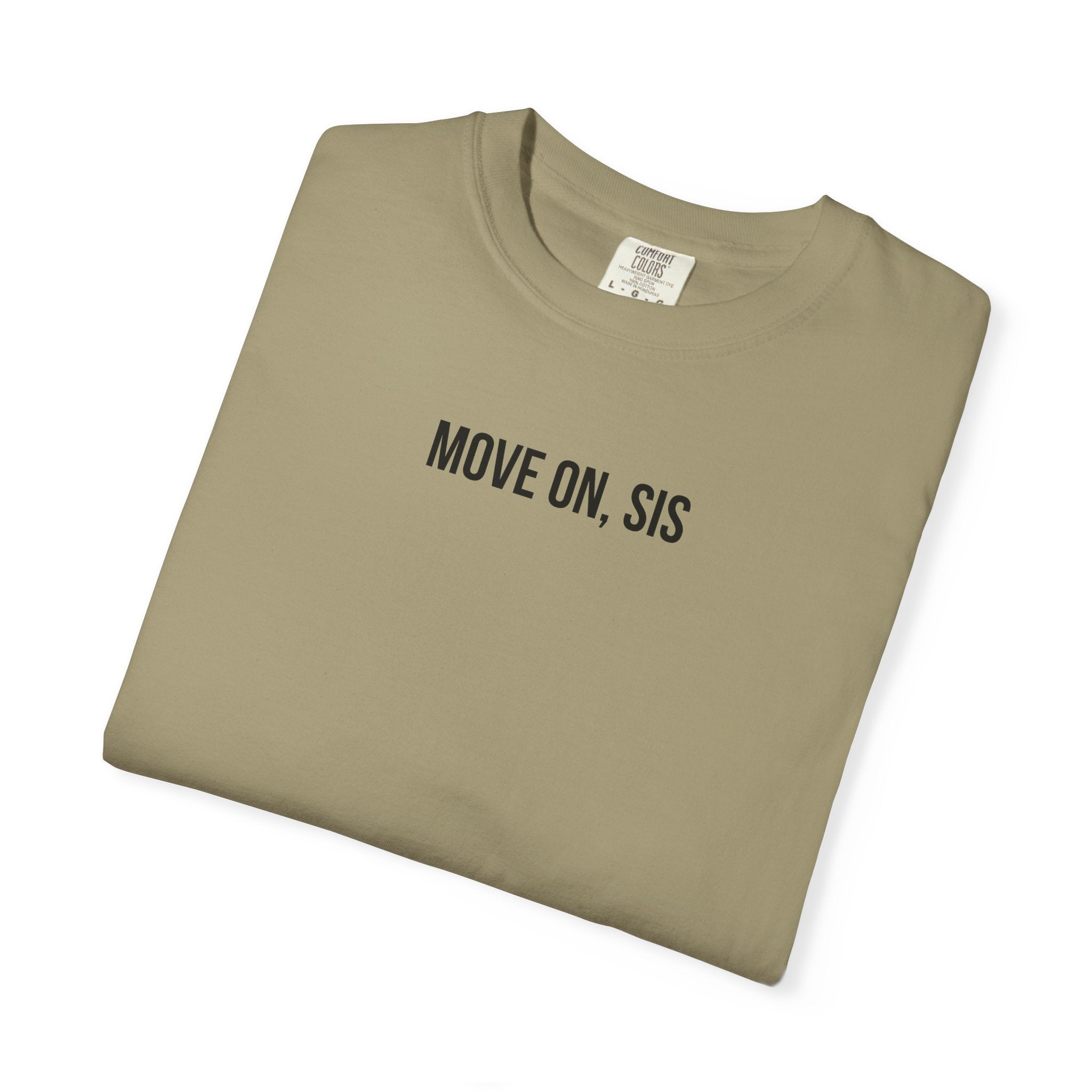Folded khaki t-shirt with 'MOVE ON, SIS' text on a white background